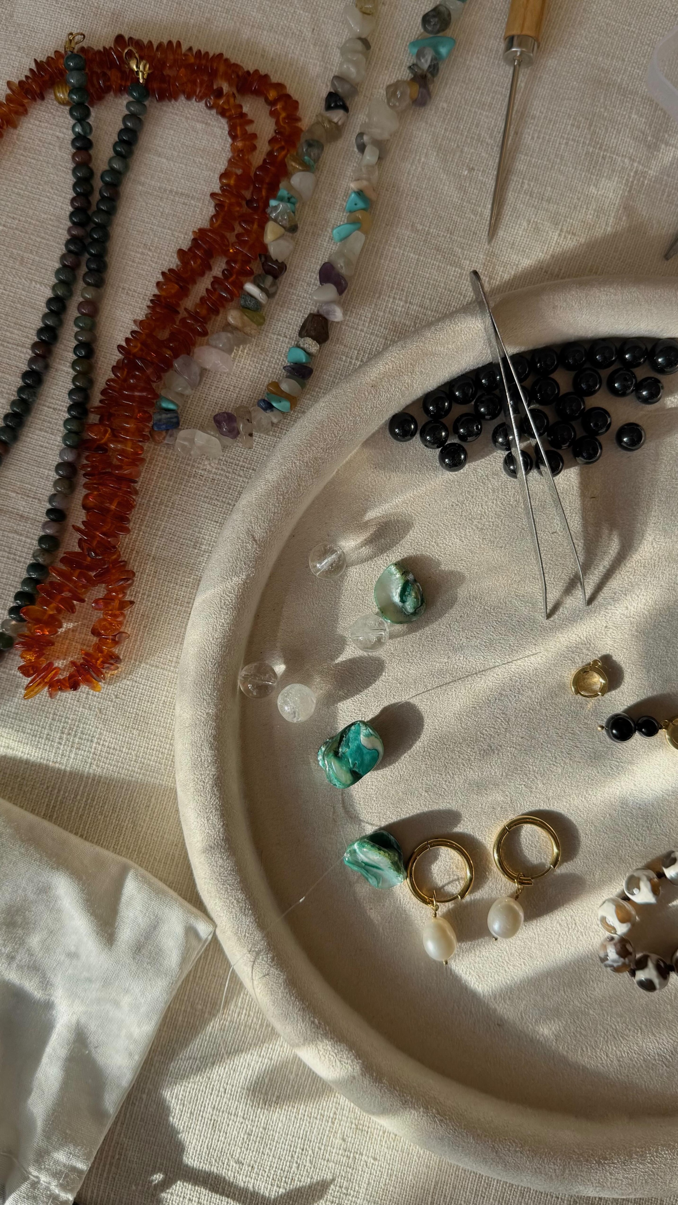 MOOSAI Studio workspace — handcrafting jewellery with natural pearls and gemstones