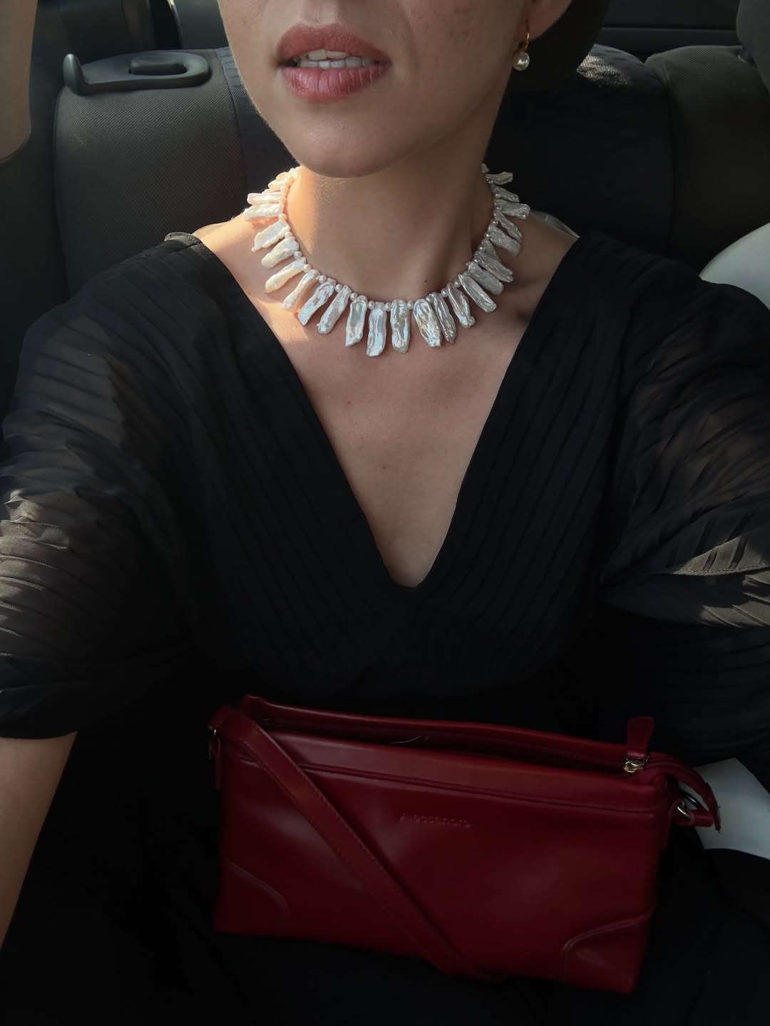 Biwa pearl necklace worn with black outfit